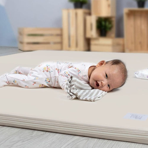 Baby Lying on LUXE Baby Foldable Mat